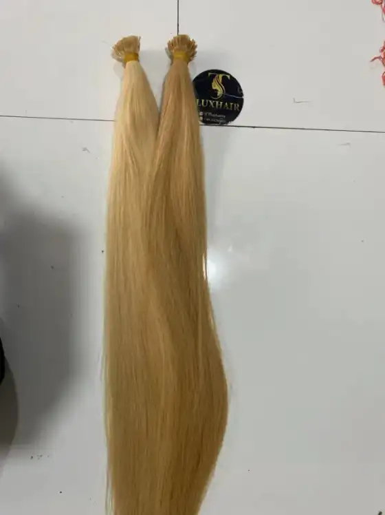 Golden blonde straight I-tip hair extensions